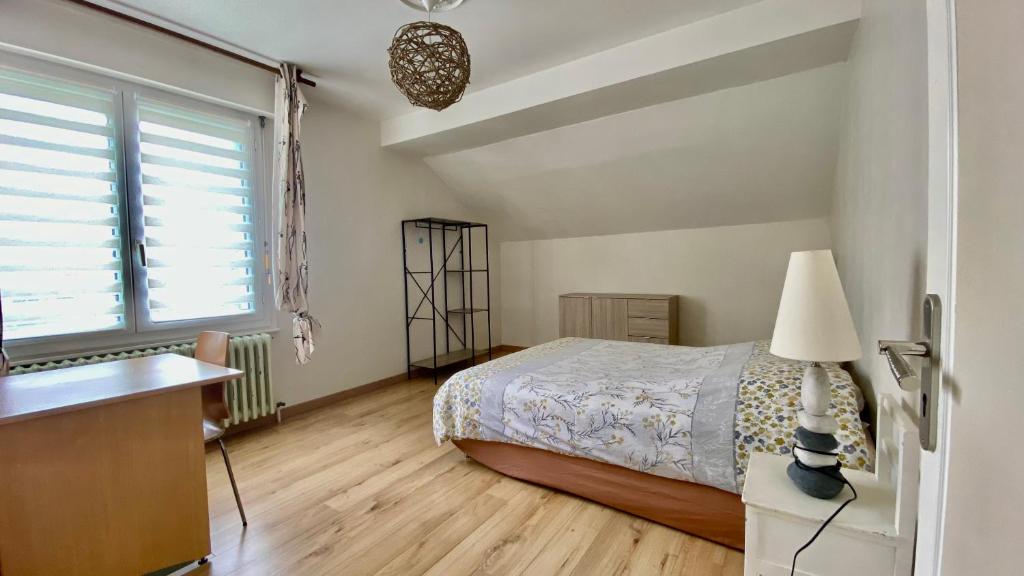 Een bed of bedden in een kamer bij Appartement 6 &agrave; 8 personnes