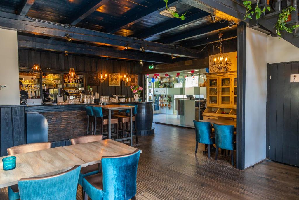 Lounge nebo bar v ubytování EuroParcs Buitenhuizen
