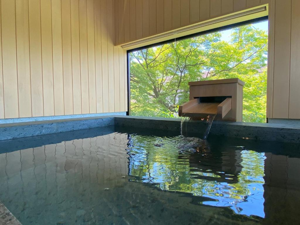 Fotografie z fotogalerie ubytování Arima Onsen Takayamaso Hanano v destinaci Kóbe