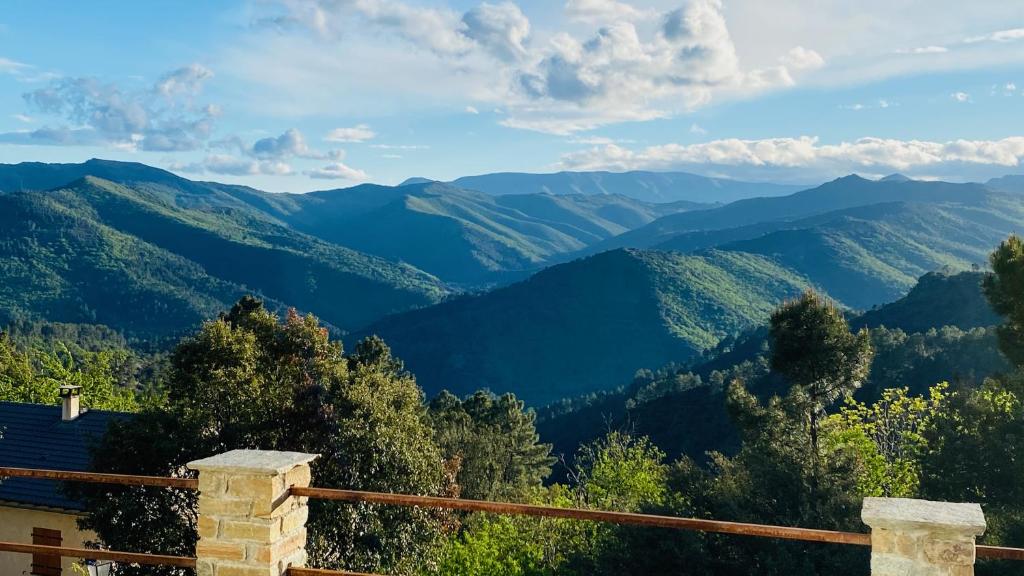 a view of the mountains from a house at Maison LGBT des Monts Bleus in Saint-Roman-de-Tousque