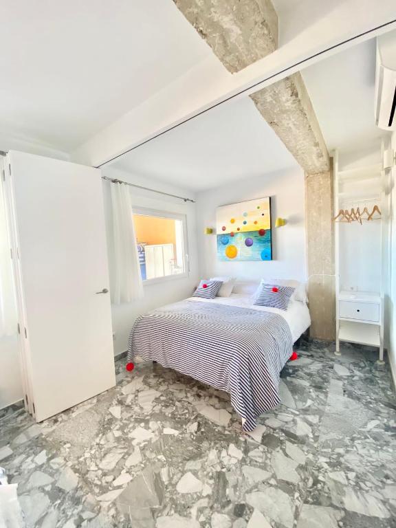 Postel nebo postele na pokoji v ubytování Apartamento centro de Dénia 1ra linea, vistas puerto y mar