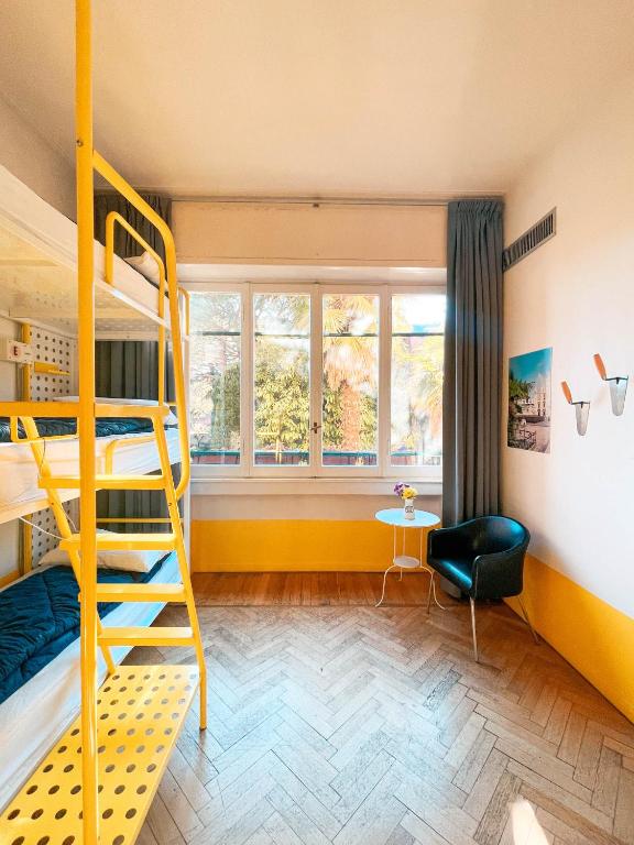 Postel nebo postele na pokoji v ubytování Ostello Bello Lake Como