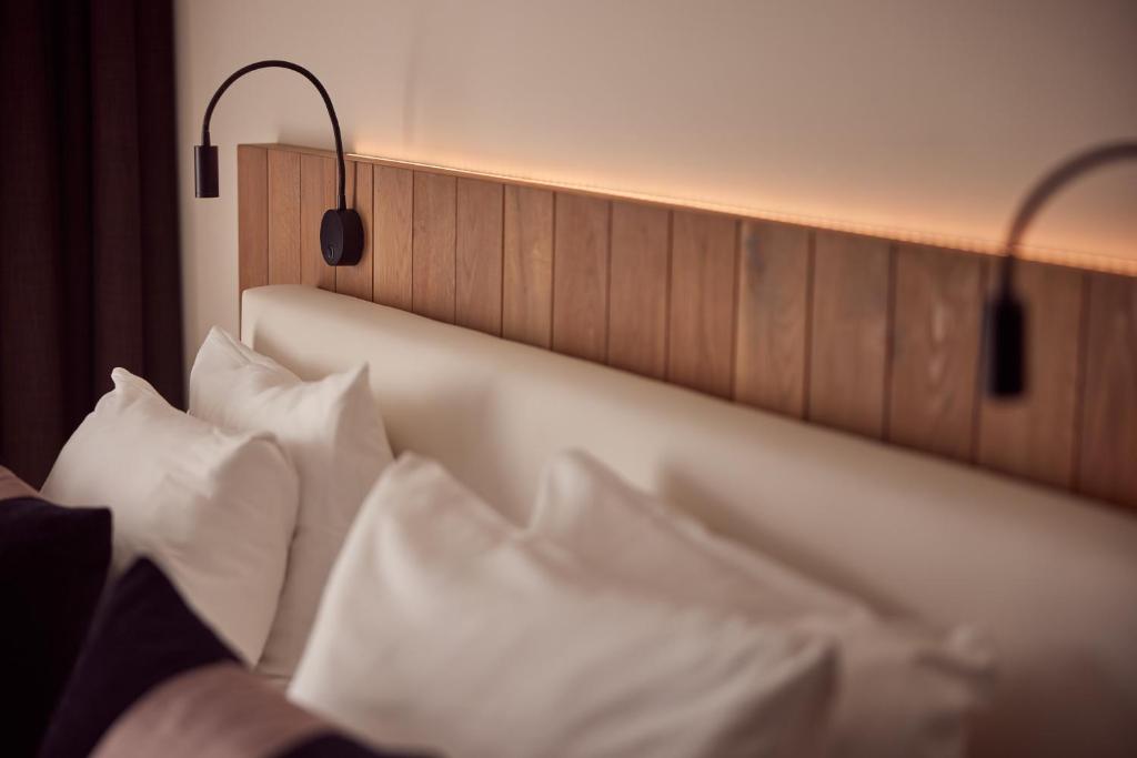 Postel nebo postele na pokoji v ubytování Van der Valk Hotel Dennenhof