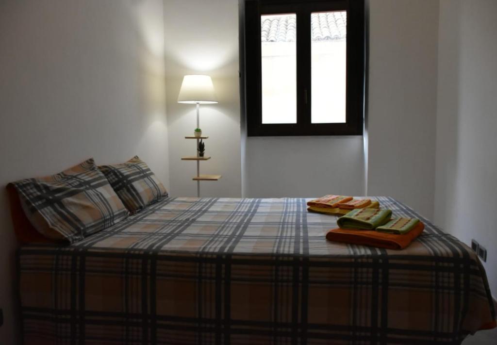 A bed or beds in a room at Civico 22