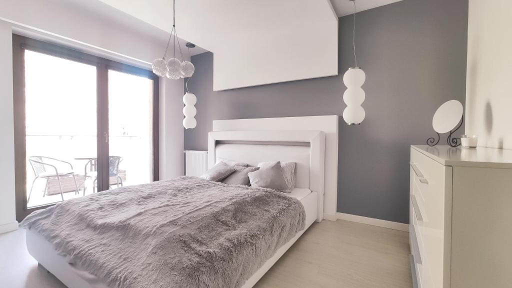 Posteľ alebo postele v izbe v ubytovaní Łokietka 8B by Homeprime
