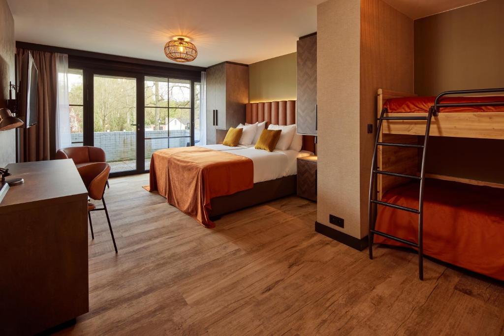 Postel nebo postele na pokoji v ubytování Van der Valk Hotel Dennenhof