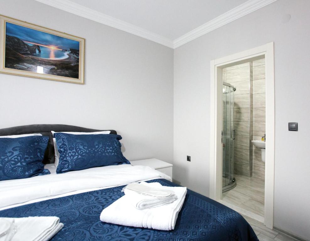 מיטה או מיטות בחדר ב-Melissa Suite Otel