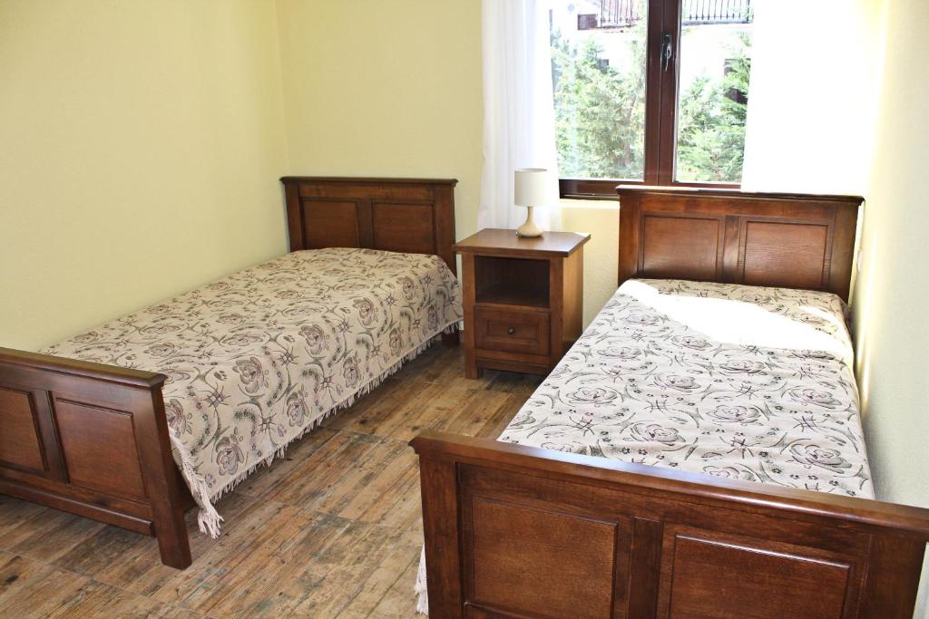 Postel nebo postele na pokoji v ubytování Villa Malina new