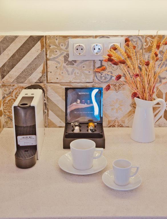 Příslušenství pro přípravu čaje a kávy v ubytování Aeolia suites