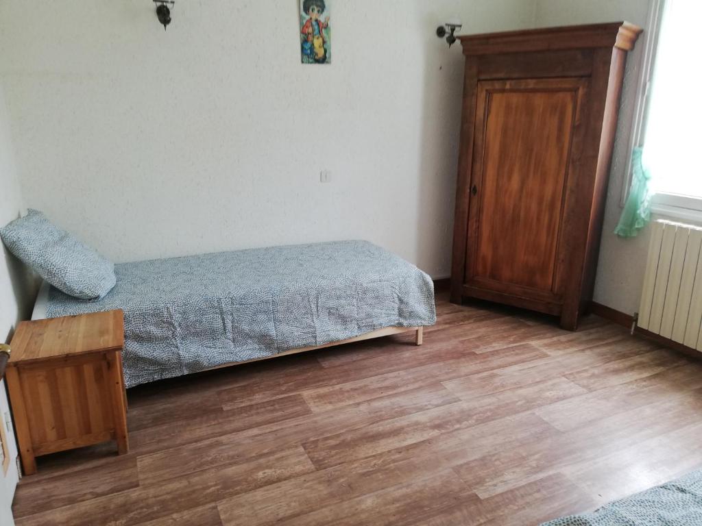 A bed or beds in a room at 1.2.3 SOLEIL