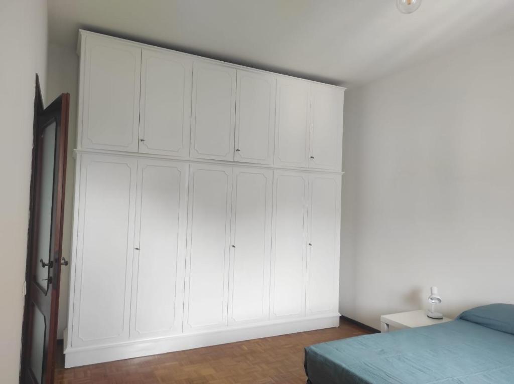 A bed or beds in a room at Casa Berizzi - Santa Lucia