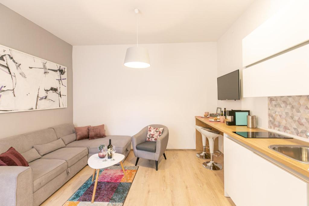Kuchyň nebo kuchyňský kout v ubytování Polai Center Apartments