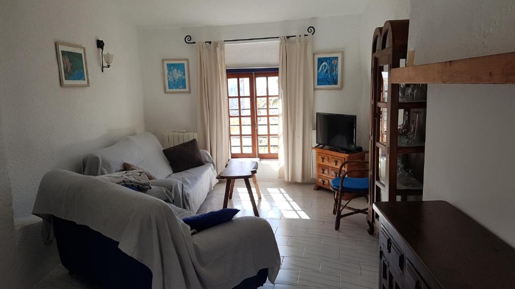 Katil atau katil-katil dalam bilik di Gemütliches Altstadthaus am Kirchplatz in Calpe