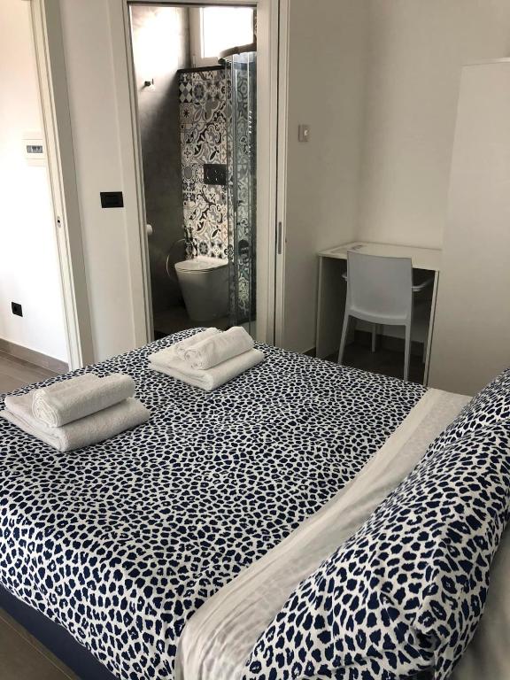 Postel nebo postele na pokoji v ubytování Farau B&B