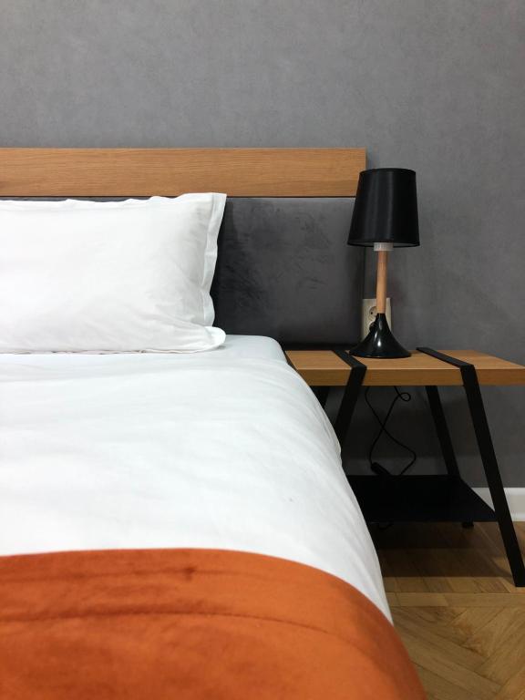Postel nebo postele na pokoji v ubytování Hotel 1887