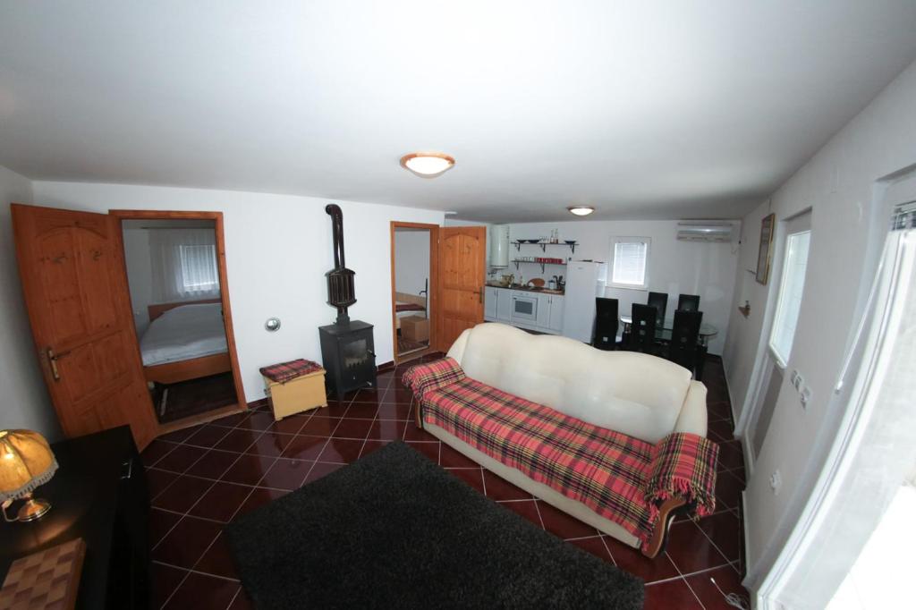 Postel nebo postele na pokoji v ubytování Chalets & Rooms Čarda Šebešfok