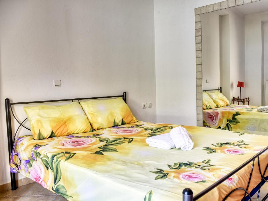 Postel nebo postele na pokoji v ubytování Tagkas Apartments