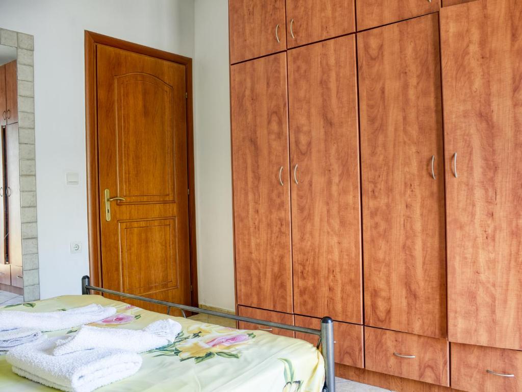 Postel nebo postele na pokoji v ubytování Tagkas Apartments