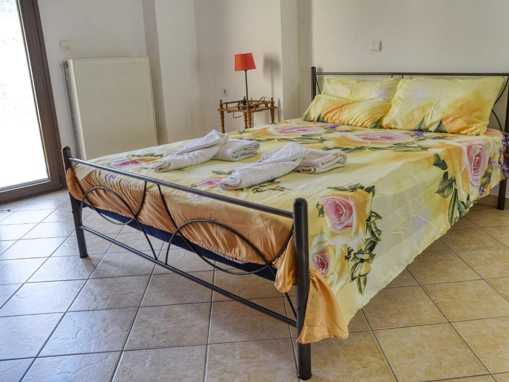 Postel nebo postele na pokoji v ubytování Tagkas Apartments