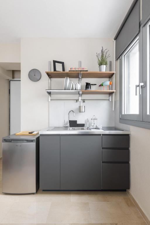 A kitchen or kitchenette at Boho Rooms