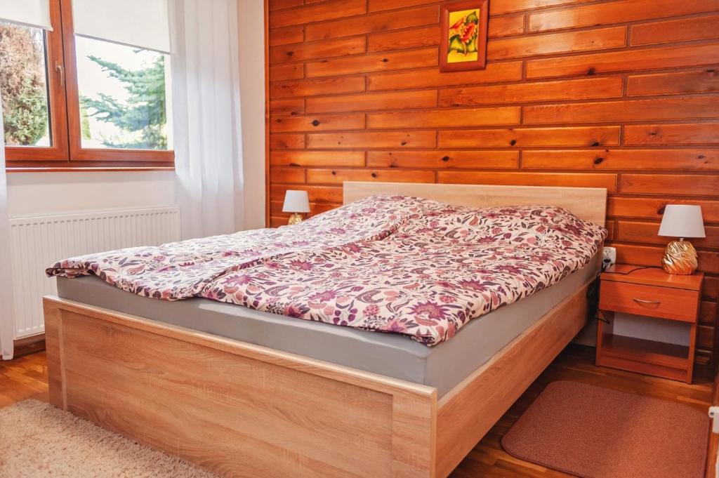 Postel nebo postele na pokoji v ubytování Za górami, za lasami