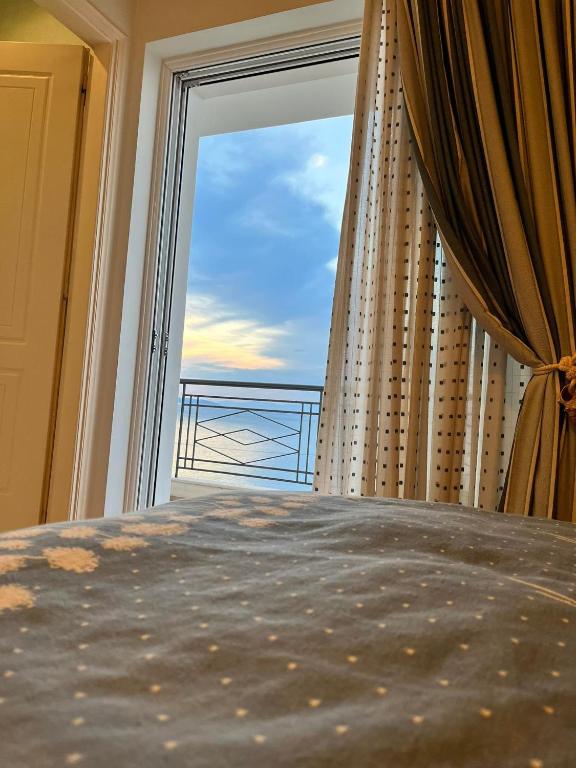 Postel nebo postele na pokoji v ubytování Villa sul Mare