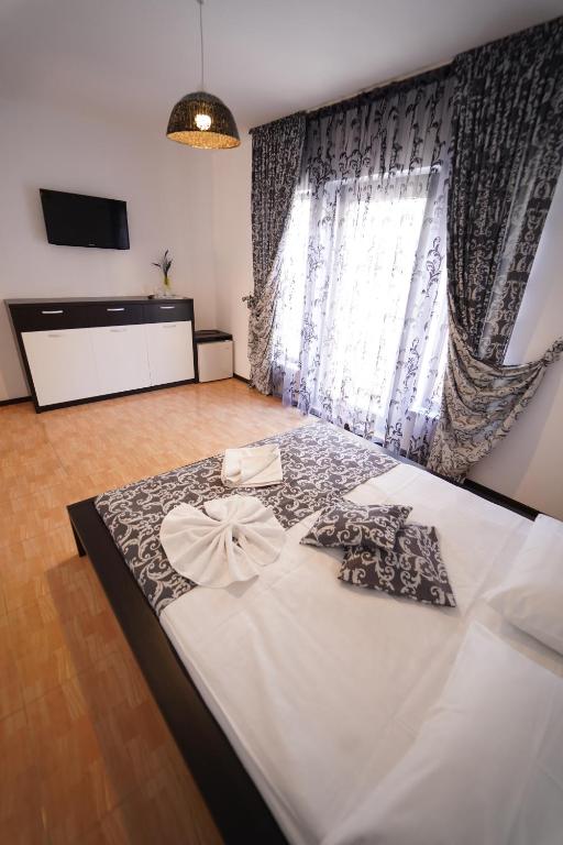 Postel nebo postele na pokoji v ubytování Complex Marinn Costinesti