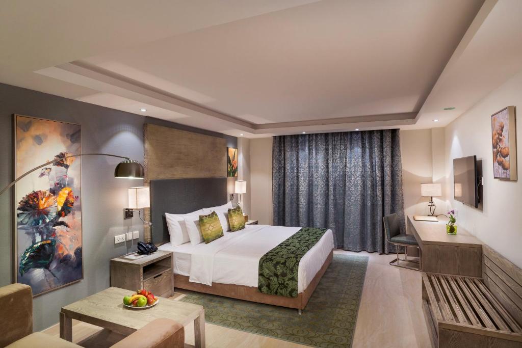 Centara Muscat Hotel Omanにあるベッド