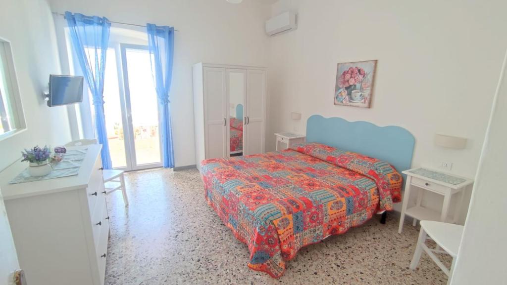Postel nebo postele na pokoji v ubytování Casa del Mare