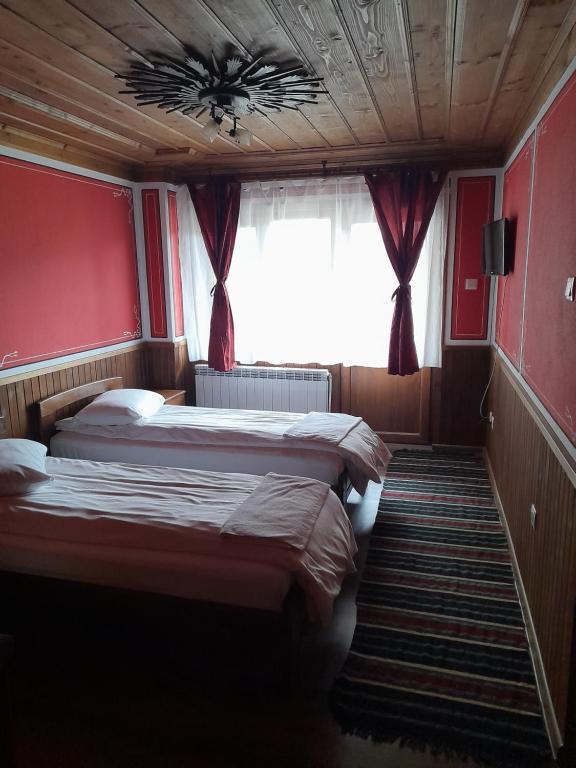 Postel nebo postele na pokoji v ubytování Къща Ради