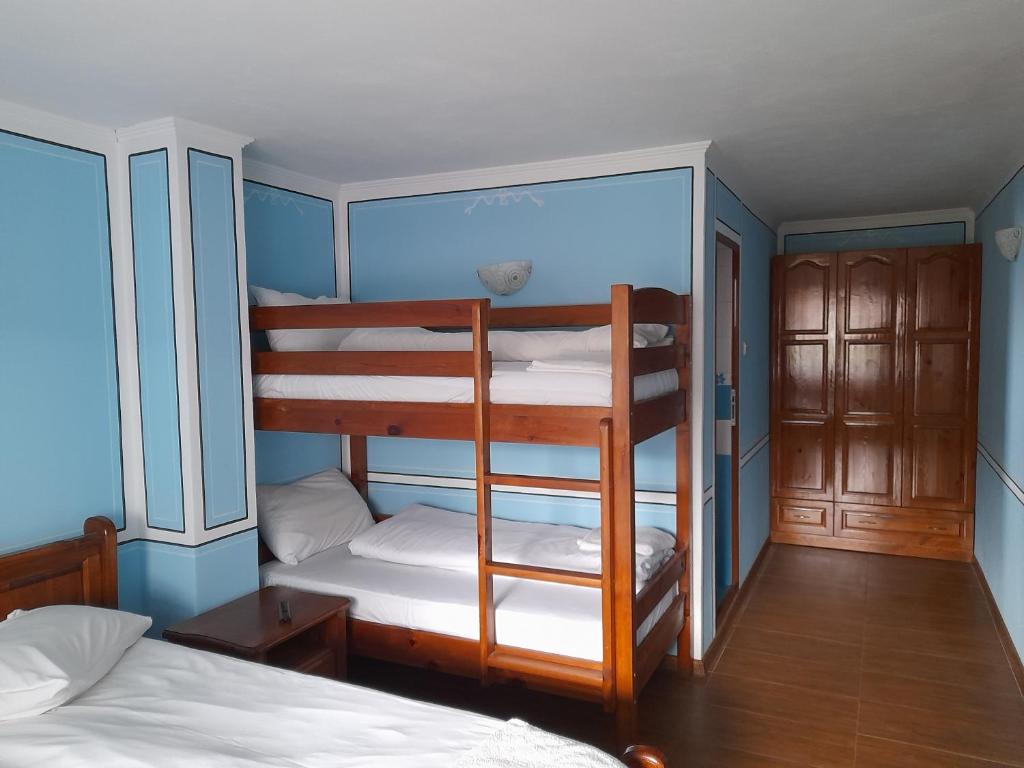 Postel nebo postele na pokoji v ubytování Къща Ради