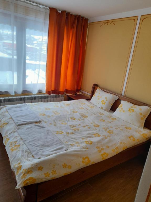 Postel nebo postele na pokoji v ubytování Къща Ради