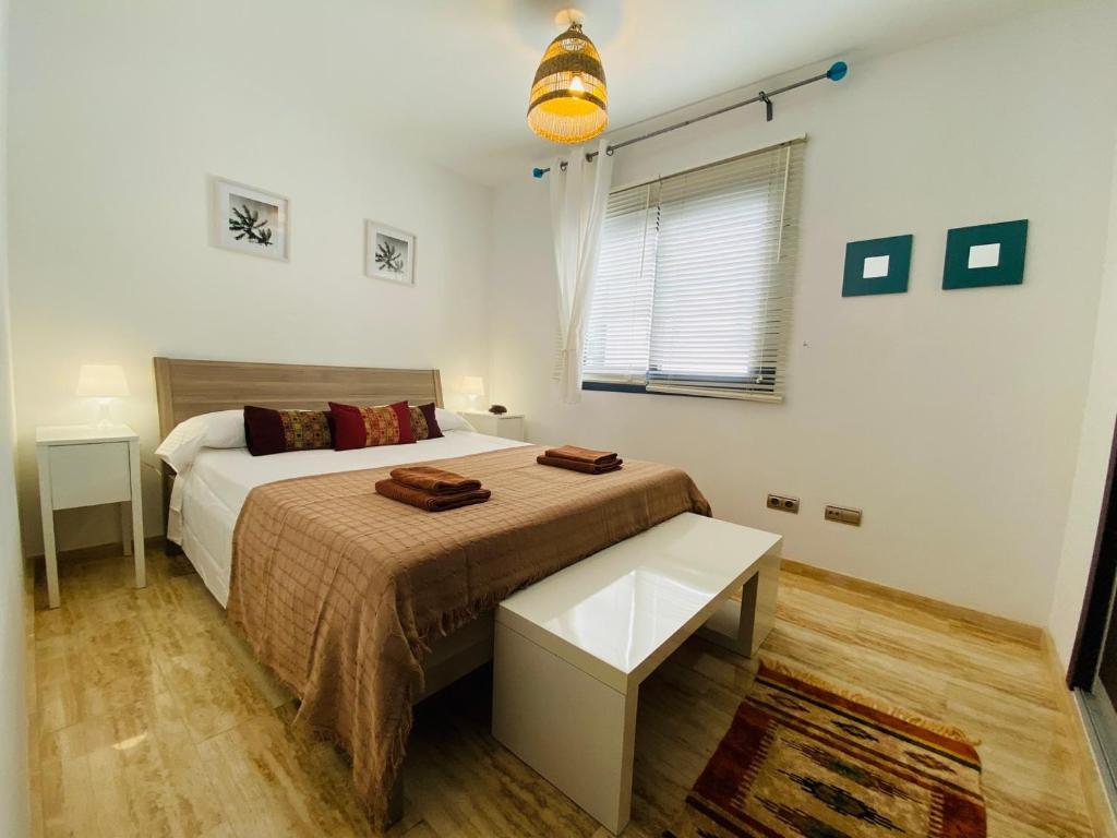Postel nebo postele na pokoji v ubytování Apartamento Mar i Sol El Cotillo