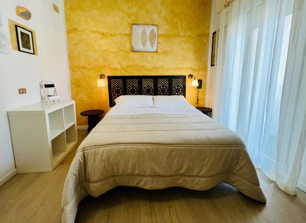 Posteľ alebo postele v izbe v ubytovaní B&B Everest Bar Ristorantino