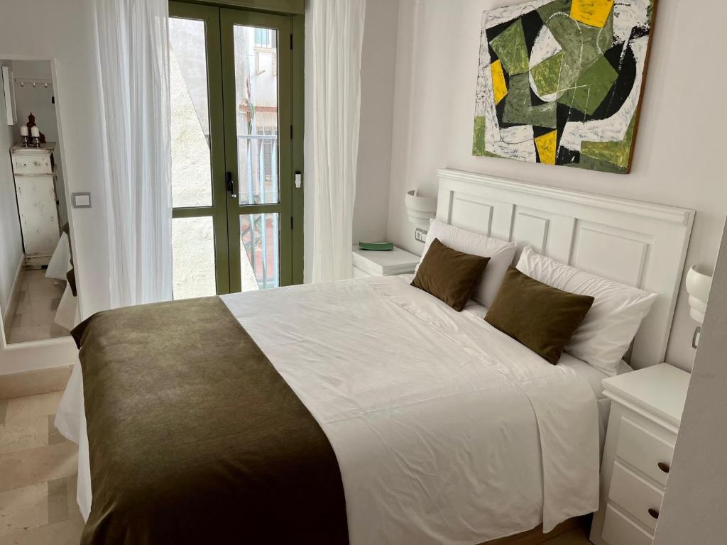 Cama o camas de una habitación en Brand new apartment Downtown Sevilla