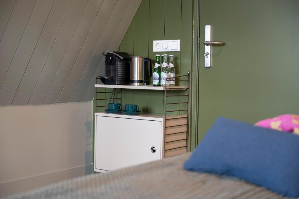 Postel nebo postele na pokoji v ubytování B&B Turfkade9