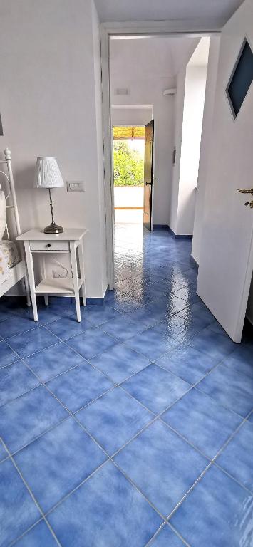 Łóżko lub łóżka w pokoju w obiekcie Relais Amalfi Coast