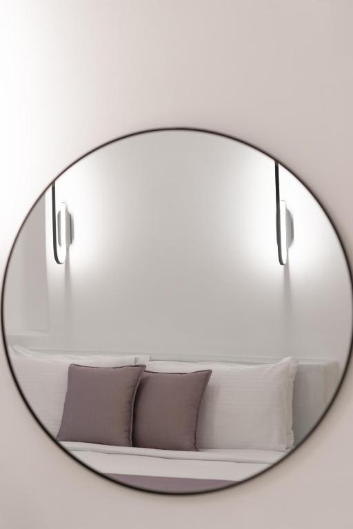 Postel nebo postele na pokoji v ubytování Asha Luxury Suites