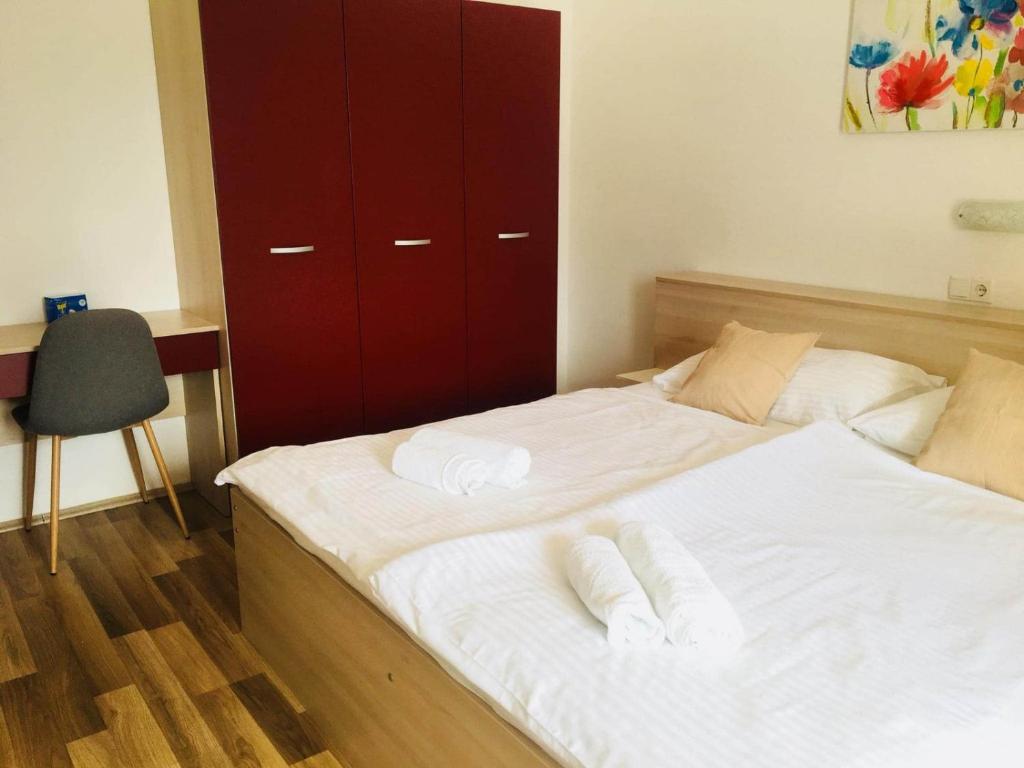 Postel nebo postele na pokoji v ubytování Meduza B&b