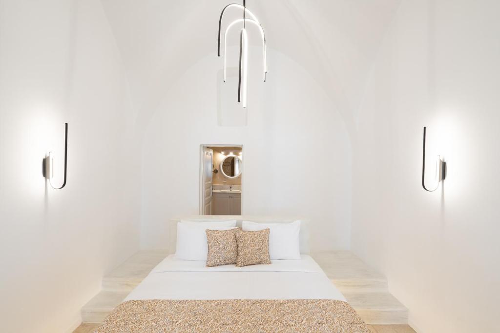 Postel nebo postele na pokoji v ubytování Asha Luxury Suites