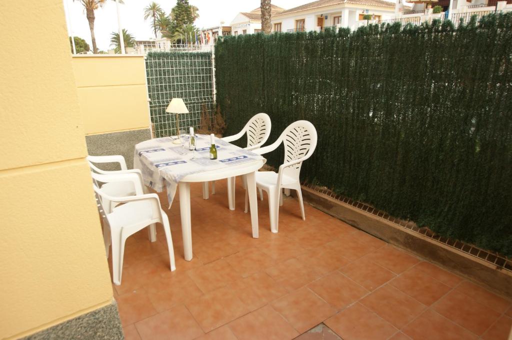 Balkón nebo terasa v ubytování Apartamento en Vera a 300 m de la playa, con patio y salida directa a calle