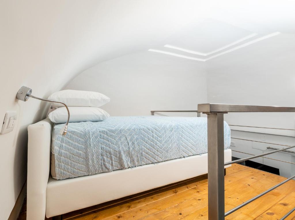 Posteľ alebo postele v izbe v ubytovaní Santoro Suite - De Vivo Realty Sorrento