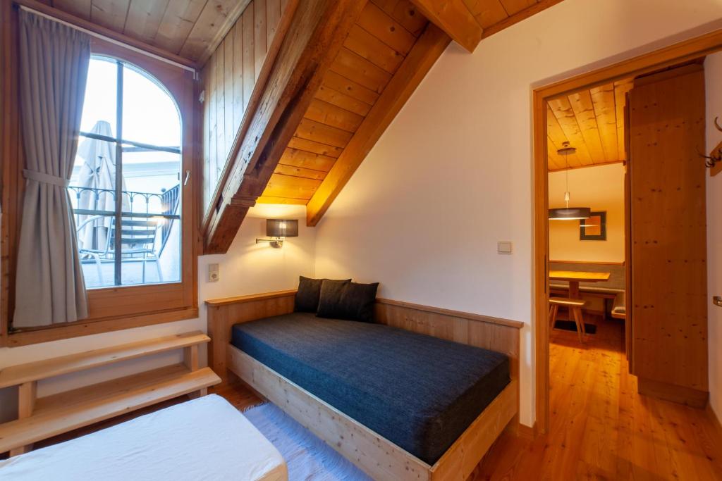 Postel nebo postele na pokoji v ubytování Hotel Greif
