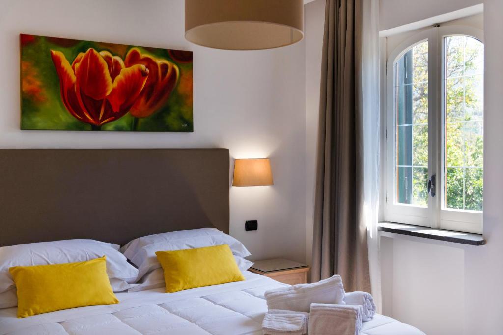 Postel nebo postele na pokoji v ubytování Villa Francesca Relais