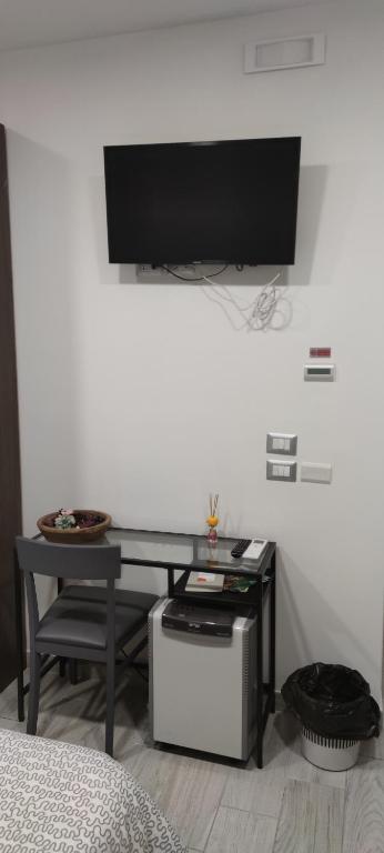 TV o dispositivi per l'intrattenimento presso Guest House Via Milano