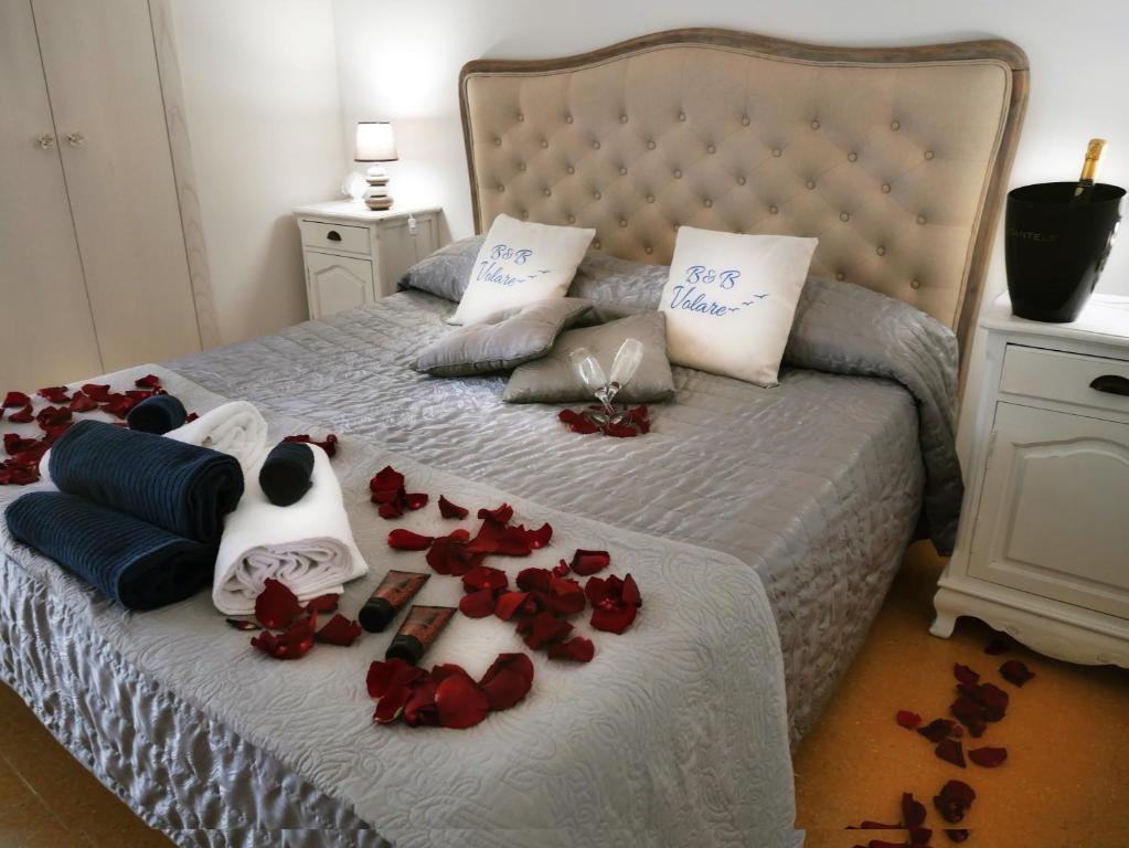 Posteľ alebo postele v izbe v ubytovaní B&B VOLARE