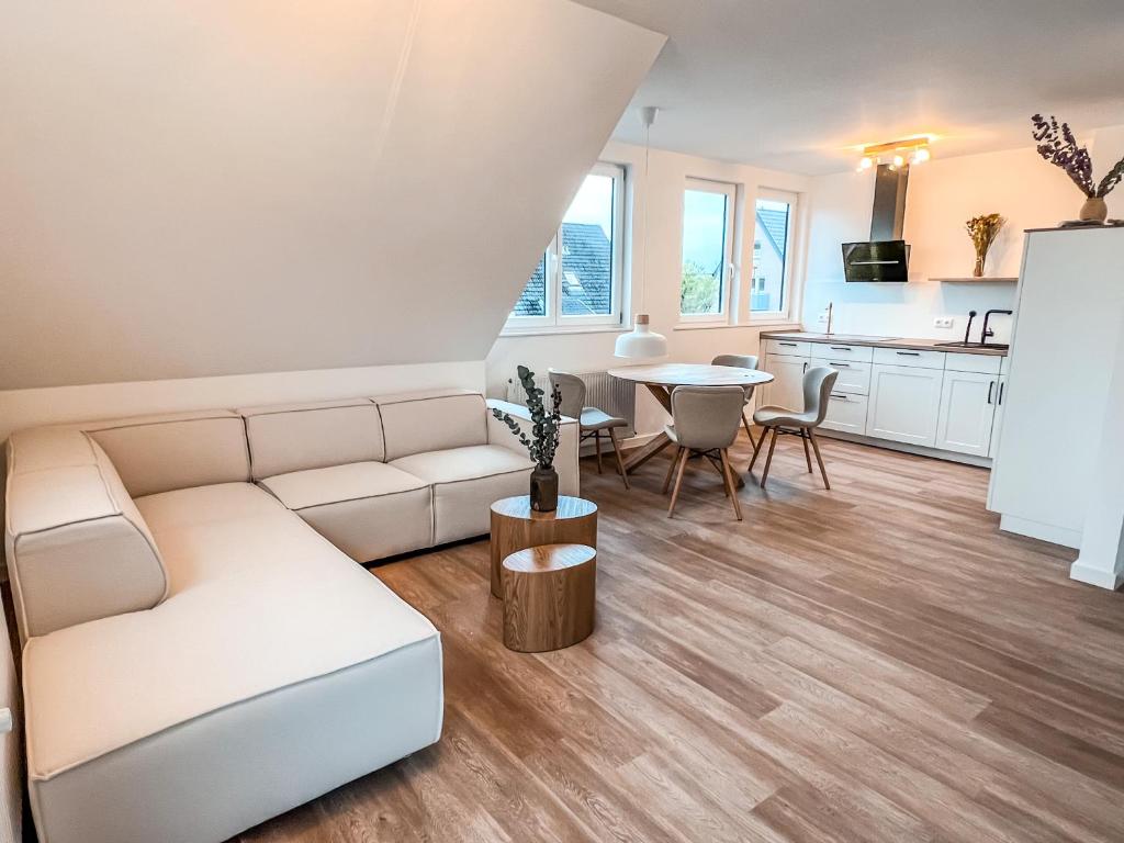 Posezení v ubytování Dyke Appartements