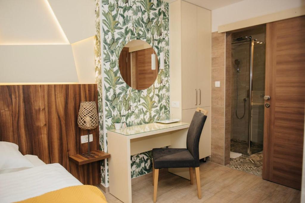 Postel nebo postele na pokoji v ubytování Hotel - Villa Lejla