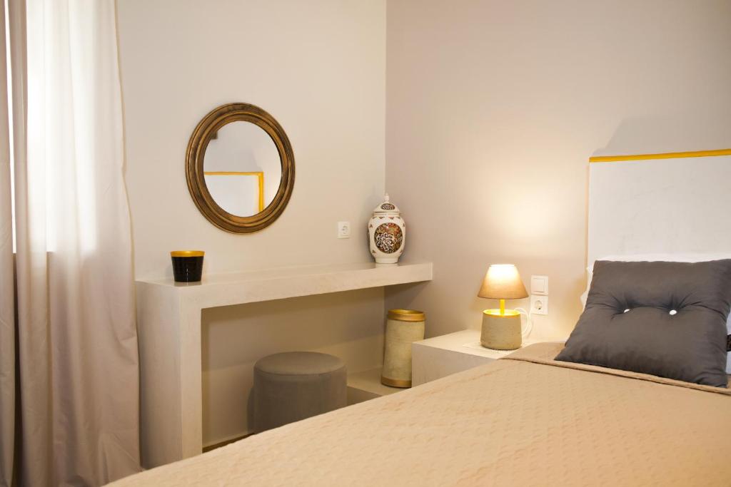 Postel nebo postele na pokoji v ubytování Praxitelis Luxury Apartments