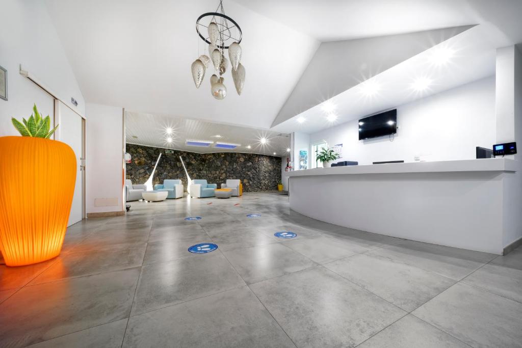 TV a/nebo společenská místnost v ubytování Aqua Suites